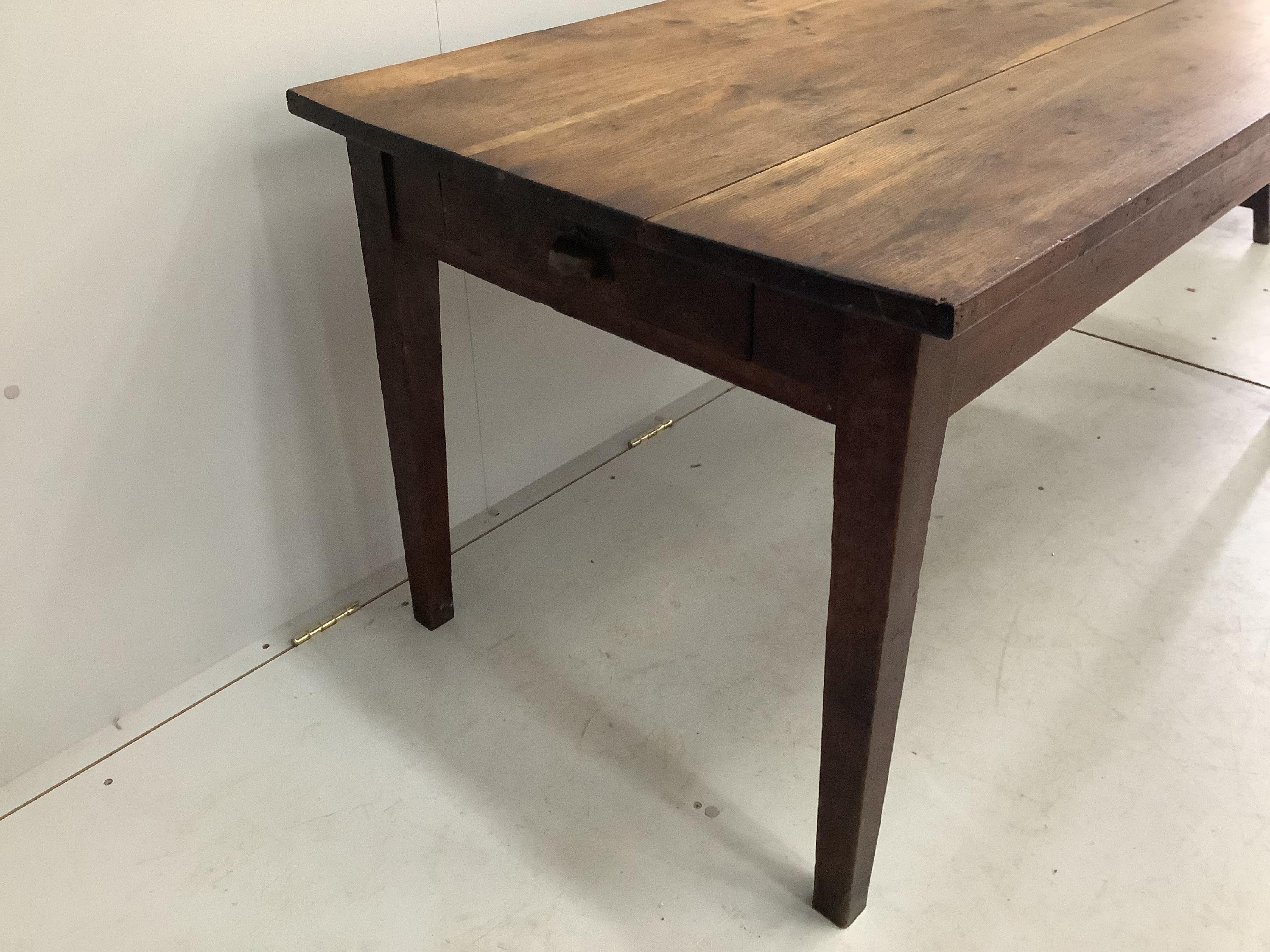 A 19th century French rectangular oak kitchen table, width 150cm, depth 79cm, height 73cm